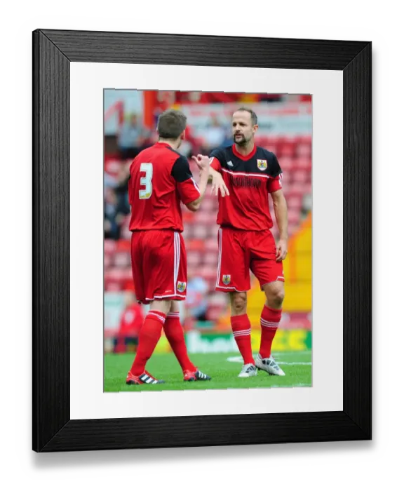 Framed Print : Louis Carey's Testimonial: A Special Moment at Ashton Gate as Bristol City and Bristol Rovers Face Off