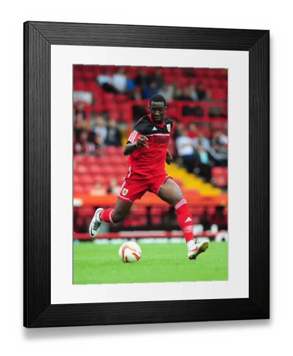 Framed Print : Bristol City's Yannick Bolasie Steals the Show at Louis Carey's Testimonial Match against Bristol Rovers, August 2012 Framed Print : Bristol City's Yannick Bolasie Steals the Show at Louis Carey's Testimonial Match against Bristol Rovers, August 2012