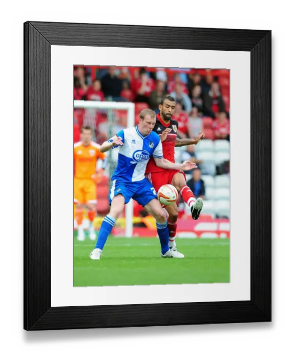 Framed Print : Battling for the Ball: Liam Fontaine vs. David Clarkson - Bristol City vs. Bristol Rovers, 2012 (Louis Carey Testimonial) Framed Print : Battling for the Ball: Liam Fontaine vs. David Clarkson - Bristol City vs. Bristol Rovers, 2012 (Louis Carey Testimonial)