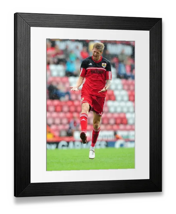 Framed Print : Jon Stead's Frustration: A Tense Moment at the Louis Carey Testimonial, Bristol City vs. Bristol Rovers (August 4, 2012)