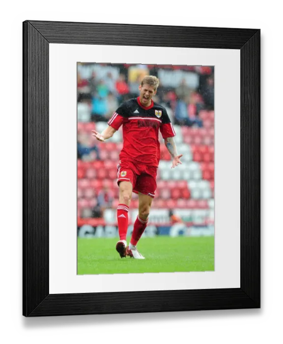 Framed Print : Frustration on the Field: Jon Stead's Intense Moment at the Louis Carey Testimonial (Bristol City vs. Bristol Rovers, 04.08.2012) Framed Print : Frustration on the Field: Jon Stead's Intense Moment at the Louis Carey Testimonial (Bristol City vs. Bristol Rovers, 04.08.2012)