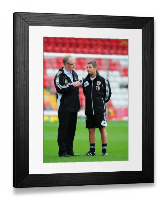 Framed Print : Bristol City FC: Assistant Manager Tony Docherty in Deep Discussion with David Lloyd during Pre-Season Open Day Framed Print : Bristol City FC: Assistant Manager Tony Docherty in Deep Discussion with David Lloyd during Pre-Season Open Day