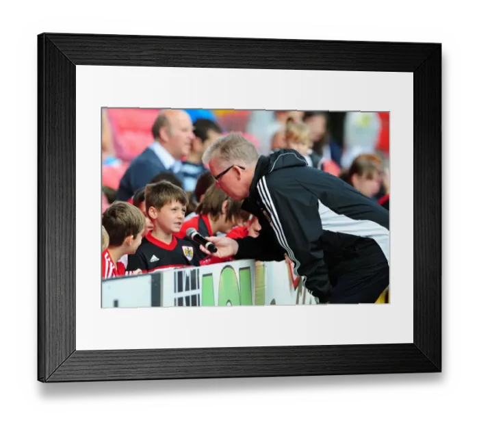 Framed Print : Bristol City FC: David Lloyd Engages with a Fan at Pre-Season Open Day Framed Print : Bristol City FC: David Lloyd Engages with a Fan at Pre-Season Open Day