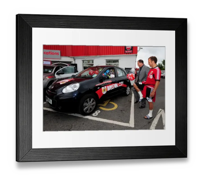 Framed Print : Bristol City FC: Wessex Garages Open Day - Flicking Footballs into a Car