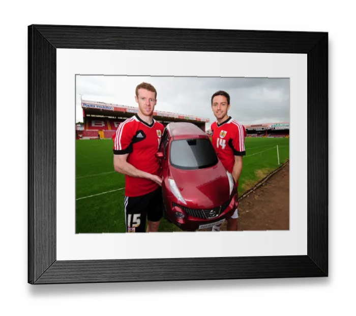 Framed Print : Bristol City Footballers Stephen Pearson and Cole Skuse with Wessex Garages Baby Duke at Pre-Season Open Day Framed Print : Bristol City Footballers Stephen Pearson and Cole Skuse with Wessex Garages Baby Duke at Pre-Season Open Day