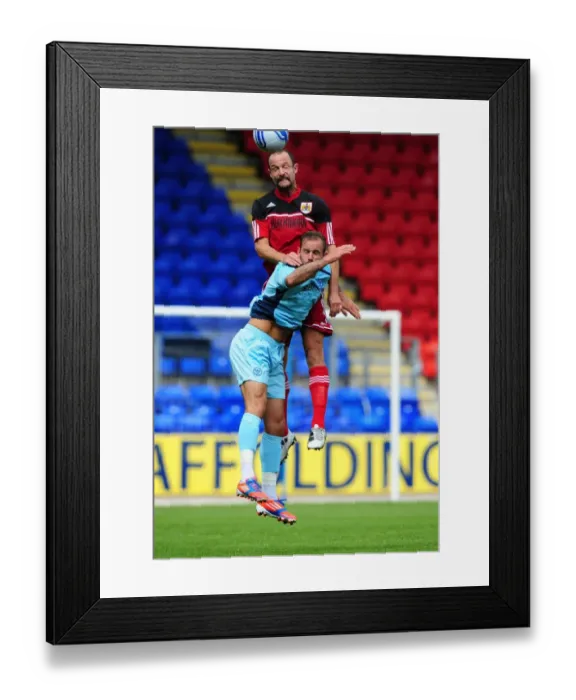 Framed Print : Louis Carey Wins the High Ball: Bristol City's Pre-Season Victory over St Johnstone at McDiarmid Park, 2012 Framed Print : Louis Carey Wins the High Ball: Bristol City's Pre-Season Victory over St Johnstone at McDiarmid Park, 2012