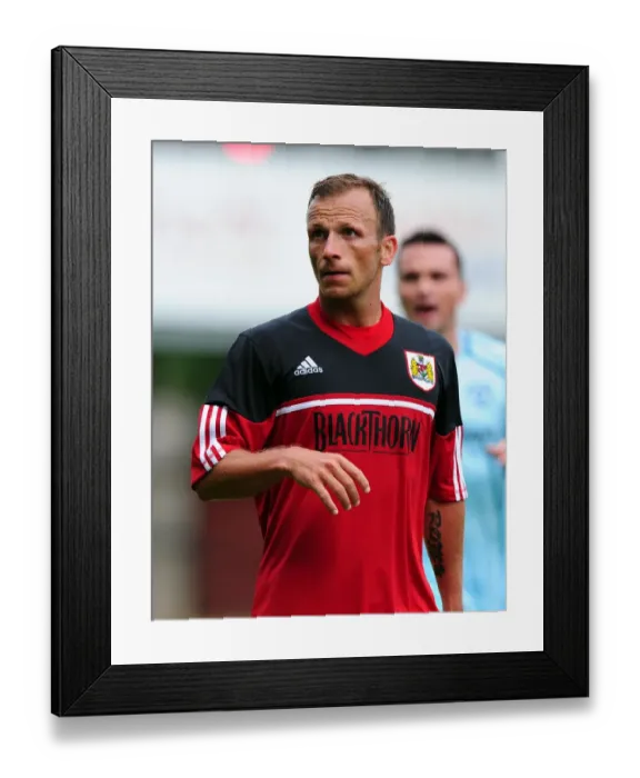 Framed Print : Jody Morris Emotional Return: A Bittersweet Reunion at McDiarmid Park - Bristol City vs. St Johnstone Pre-Season Friendly, July 2012