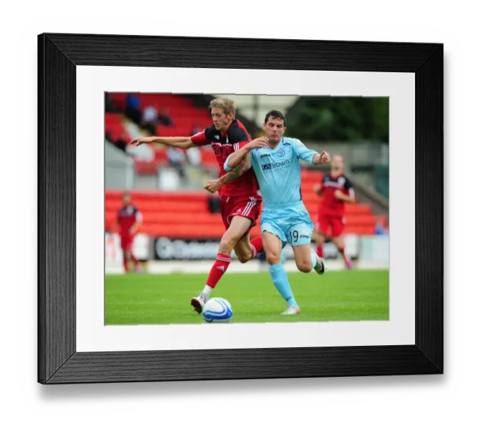 Framed Print : Bristol City's Jon Stead vs St Johnstone's Gary Miller - Football Rivalry at McDiarmid Park (Pre-Season Friendly, 2012)