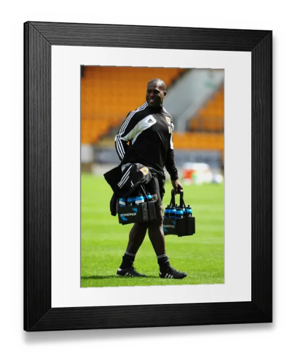Framed Print : Bristol City FC: Kunle, Fitness Coach at Work during Pre-Season Friendly vs St Johnstone, July 2012 Framed Print : Bristol City FC: Kunle, Fitness Coach at Work during Pre-Season Friendly vs St Johnstone, July 2012