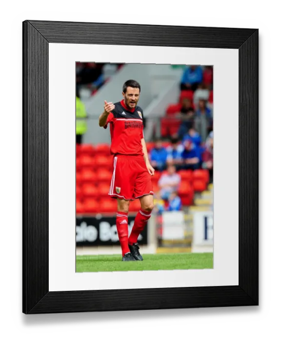 Framed Print : Cole Skuse in Action: Bristol City's Midfielder Fights for Possession at McDiarmid Park (2012)