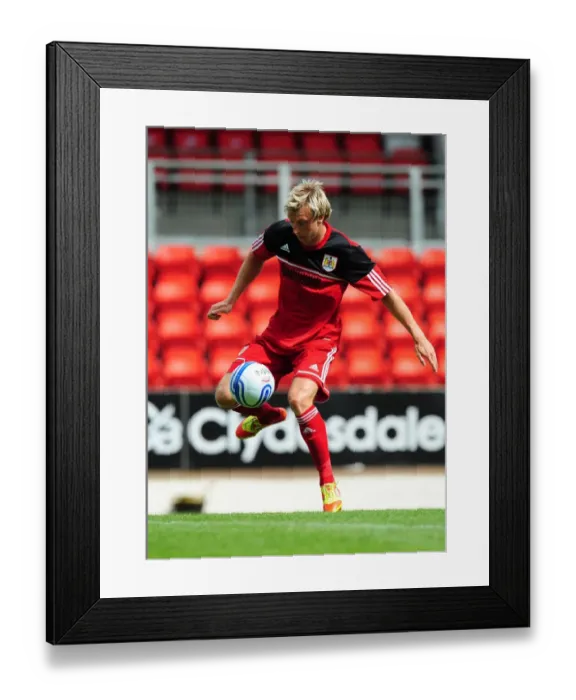 Framed Print : Martyn Woolford of Bristol City in Action at McDiarmid Park during St Johnstone vs. Bristol City Pre-Season Friendly, July 2012 Framed Print : Martyn Woolford of Bristol City in Action at McDiarmid Park during St Johnstone vs. Bristol City Pre-Season Friendly, July 2012