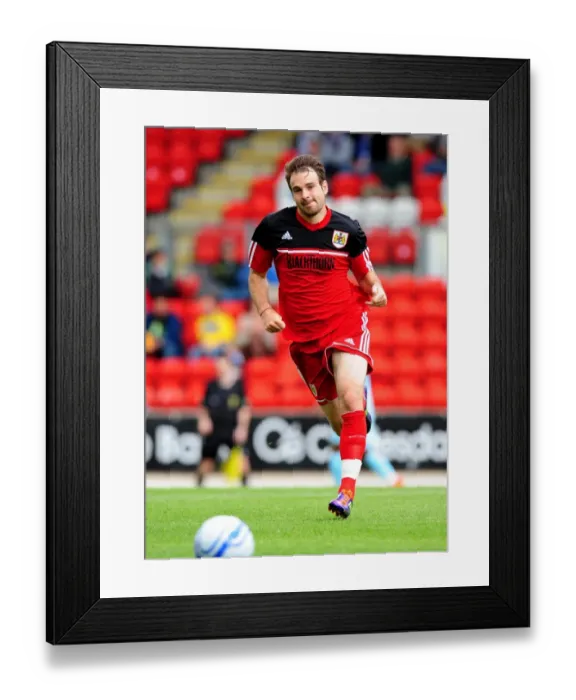 Framed Print : Brett Pitman in Action: A Football Rivalry Unfolds at McDiarmid Park (2012) Framed Print : Brett Pitman in Action: A Football Rivalry Unfolds at McDiarmid Park (2012)