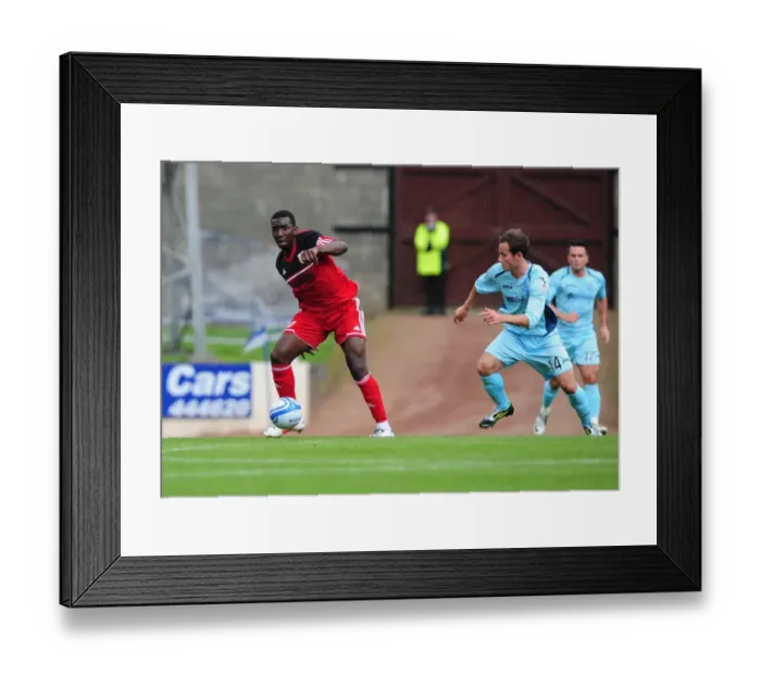 Framed Print : Yannick Bolasie in Action: Bristol City vs St Johnstone, Pre-Season Friendly at McDiarmid Park, 2012 Framed Print : Yannick Bolasie in Action: Bristol City vs St Johnstone, Pre-Season Friendly at McDiarmid Park, 2012