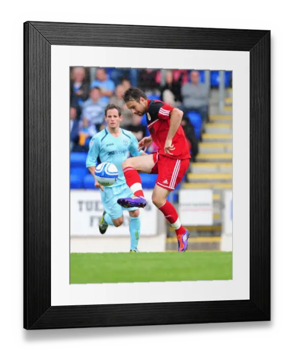 Framed Print : Brett Pitman Fueling Football Rivalry: A Tense Moment at McDiarmid Park, 2012 Framed Print : Brett Pitman Fueling Football Rivalry: A Tense Moment at McDiarmid Park, 2012