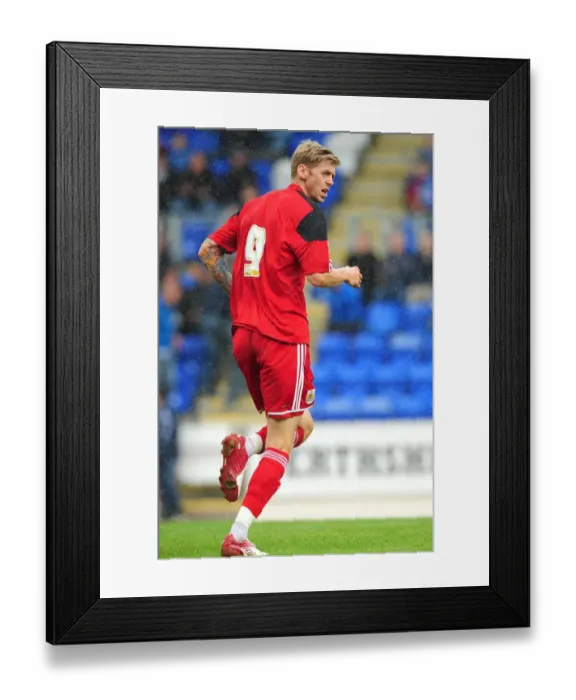 Framed Print : Jon Stead of Bristol City in Action against St Johnstone at McDiarmid Park, Perth (Pre-Season Friendly), August 2012