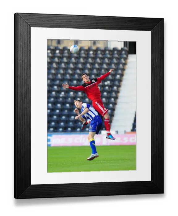 Framed Print : Bristol City's Greg Cunningham Fouled by Rory Boulding in Kilmarnock vs. Bristol City Pre-Season Friendly Framed Print : Bristol City's Greg Cunningham Fouled by Rory Boulding in Kilmarnock vs. Bristol City Pre-Season Friendly