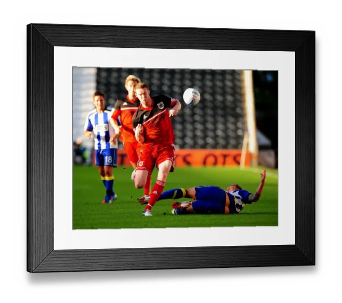 Framed Print : Bristol City's Stephen Pearson Scores Past Kilmarnock Defenders in Pre-Season Friendly
