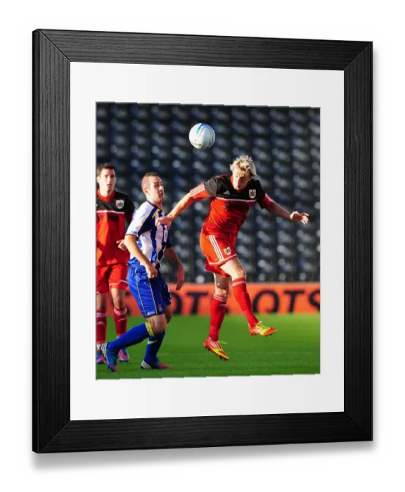 Framed Print : Martyn Woolford Claims High Ball Victory: Kilmarnock vs. Bristol City, Pre-Season Friendly, 2012 Framed Print : Martyn Woolford Claims High Ball Victory: Kilmarnock vs. Bristol City, Pre-Season Friendly, 2012
