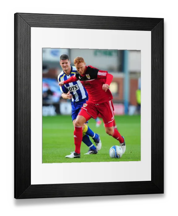 Framed Print : Bristol City's Ryan Taylor Charges Forward in Pre-Season Friendly against Kilmarnock Framed Print : Bristol City's Ryan Taylor Charges Forward in Pre-Season Friendly against Kilmarnock