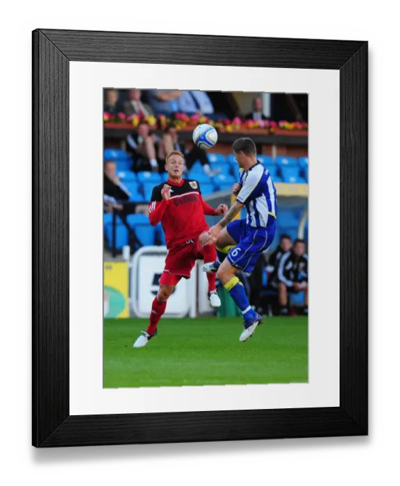 Framed Print : Battling for Supremacy: Ryan Taylor vs Michael Nelson in Kilmarnock vs Bristol City Pre-Season Clash Framed Print : Battling for Supremacy: Ryan Taylor vs Michael Nelson in Kilmarnock vs Bristol City Pre-Season Clash