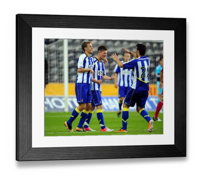 Framed Print : Kilmarnock's Matthew Kennedy in Glory: Thrilling Goal Celebration vs. Bristol City (2012)