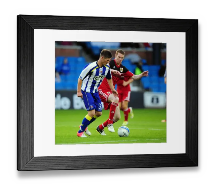 Framed Print : Battling for Supremacy: Kennedy vs. Pearson in Kilmarnock vs. Bristol City Pre-Season Clash Framed Print : Battling for Supremacy: Kennedy vs. Pearson in Kilmarnock vs. Bristol City Pre-Season Clash
