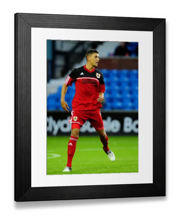 Framed Print : Bristol City's James Wilson in Action Against Kilmarnock, 2012