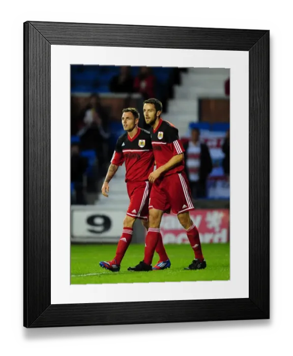 Framed Print : Bristol City Celebration: Anderson and Skuse Rejoice in Pre-Season Victory over Kilmarnock Framed Print : Bristol City Celebration: Anderson and Skuse Rejoice in Pre-Season Victory over Kilmarnock