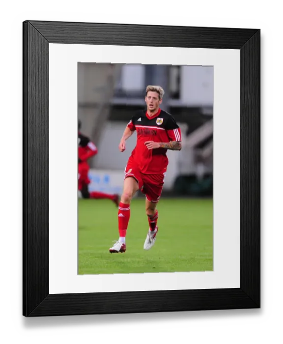 Framed Print : Jon Stead of Bristol City in Action against Dunfermline Athletic at East End Park, August 1, 2012 Framed Print : Jon Stead of Bristol City in Action against Dunfermline Athletic at East End Park, August 1, 2012