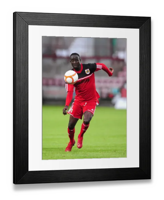 Framed Print : Adomah's Radiance: Bristol City's Pre-Season Victory over Dunfermline