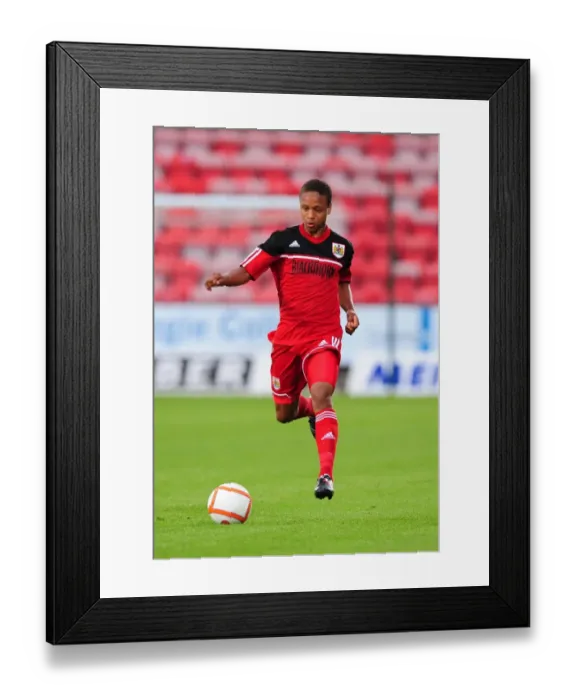 Framed Print : Bobby Reid in Action: Bristol City's Star Player Shines in Pre-Season Friendly Against Dunfermline Athletic, 2012 Framed Print : Bobby Reid in Action: Bristol City's Star Player Shines in Pre-Season Friendly Against Dunfermline Athletic, 2012