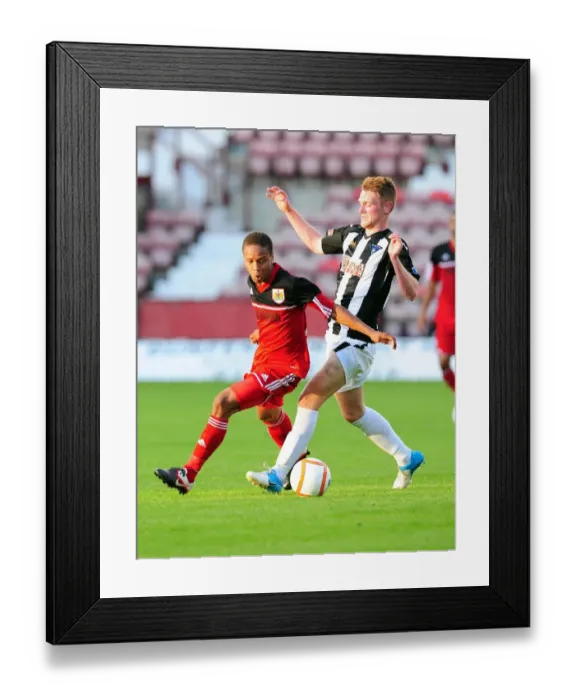 Framed Print : Bobby Reid in Action: A Thrilling Pre-Season Encounter at Dunfermline Athletic's East End Park Framed Print : Bobby Reid in Action: A Thrilling Pre-Season Encounter at Dunfermline Athletic's East End Park