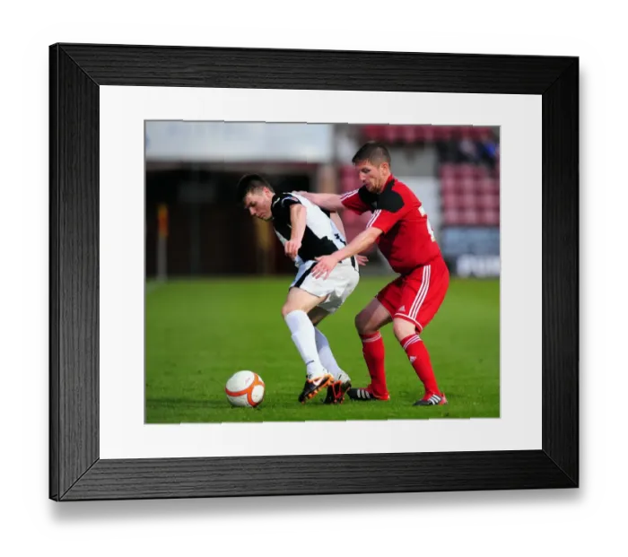 Framed Print : Bristol City's Mark Wilson vs. Dunfermline's Alex Whittle: A Battle for the Ball in Pre-Season Friendly