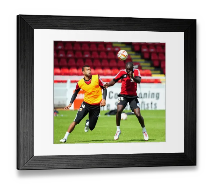 Framed Print : Bristol City Football Club: Liam Fontaine vs. Damion Stewart - A Battle for the Ball during Pre-Season Training Framed Print : Bristol City Football Club: Liam Fontaine vs. Damion Stewart - A Battle for the Ball during Pre-Season Training