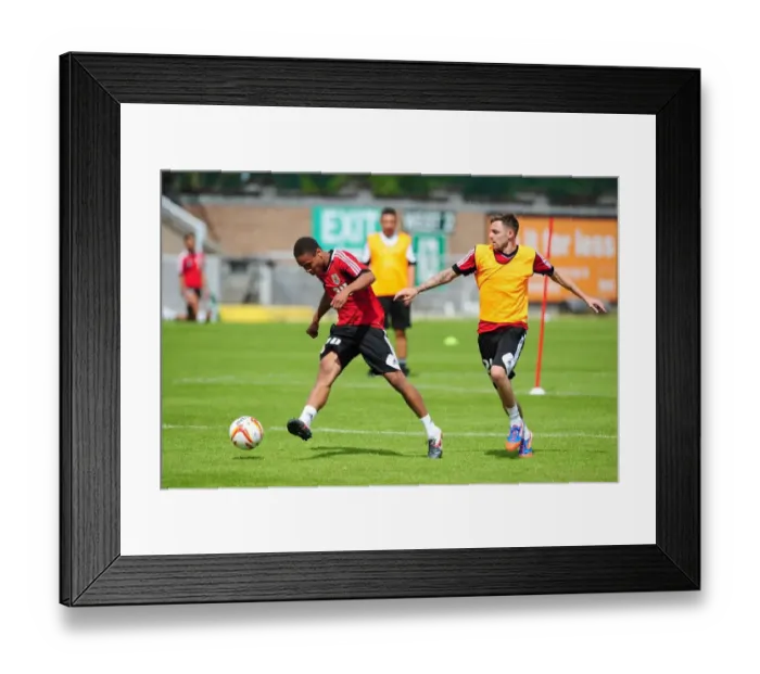 Framed Print : Intense Training Clash: Bobby Reid vs. Paul Anderson, Bristol City Football Club