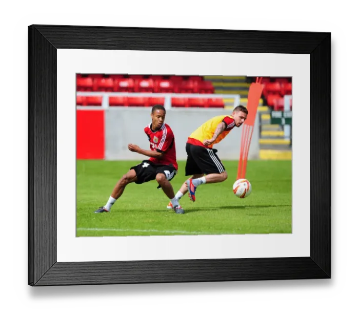 Framed Print : Bristol City FC: Intense Training Clash - Bobby Reid vs. Paul Anderson
