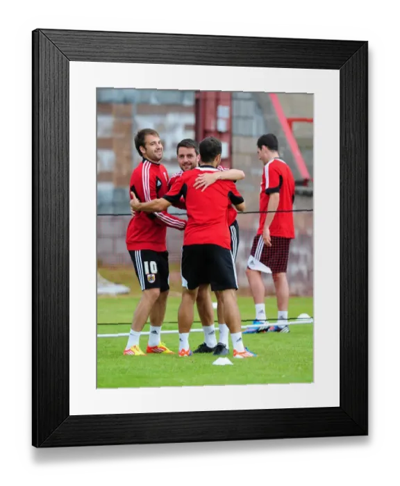 Framed Print : Bristol City Football Club: Cole Skuse and Brett Pitman Embrace During Pre-Season Training, Scotland Tour