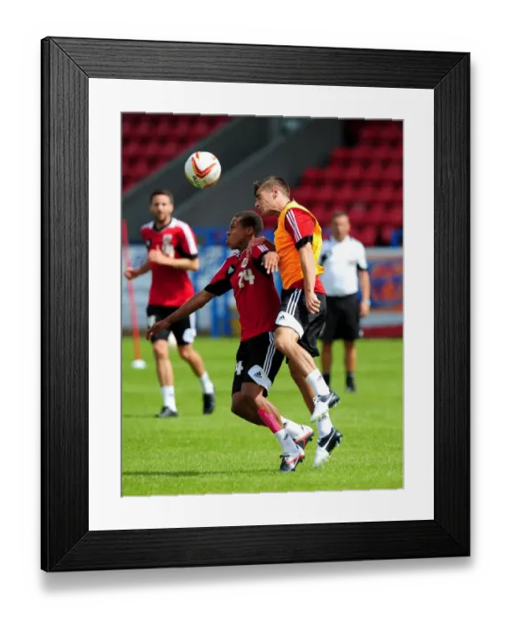 Framed Print : Bristol City Football Club: Bobby Reid vs Joe Edwards - Intense Training Battle