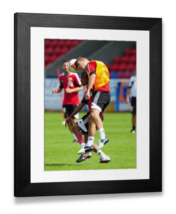 Framed Print : Intense Training Showdown: Bobby Reid vs Joe Edwards, Bristol City Football Club Framed Print : Intense Training Showdown: Bobby Reid vs Joe Edwards, Bristol City Football Club