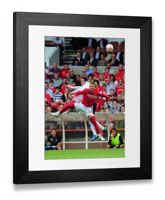 Framed Print : Battling for Supremacy: Cunningham vs. Majewski in Nottingham Forest vs. Bristol City Championship Clash Framed Print : Battling for Supremacy: Cunningham vs. Majewski in Nottingham Forest vs. Bristol City Championship Clash