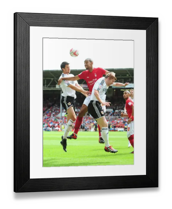 Framed Print : Intense Battle for the High Ball: Dexter Blackstock vs. Cole Skuse and Mark Wilson (Nottingham Forest vs. Bristol City, Championship 2012) Framed Print : Intense Battle for the High Ball: Dexter Blackstock vs. Cole Skuse and Mark Wilson (Nottingham Forest vs. Bristol City, Championship 2012)