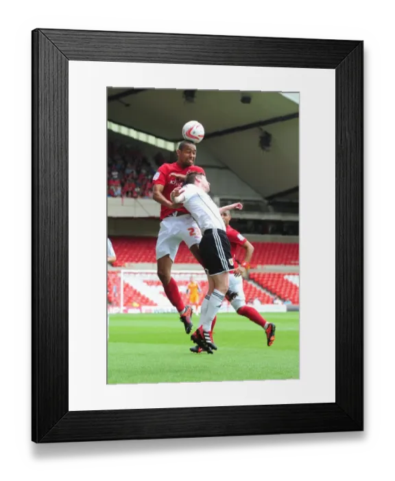 Framed Print : Battling for Supremacy: Dexter Blackstock vs Mark Wilson in Nottingham Forest vs Bristol City Championship Clash