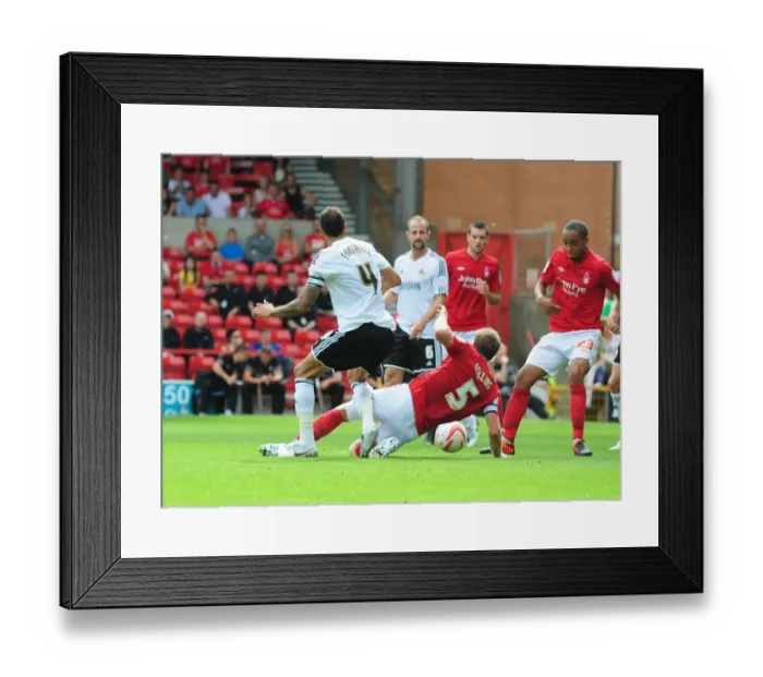 Framed Print : Bristol City's Liam Fontaine Fouls Called Back Against Nottingham Forest's Danny Collins (Nottingham Forest v Bristol City, Championship 2012)