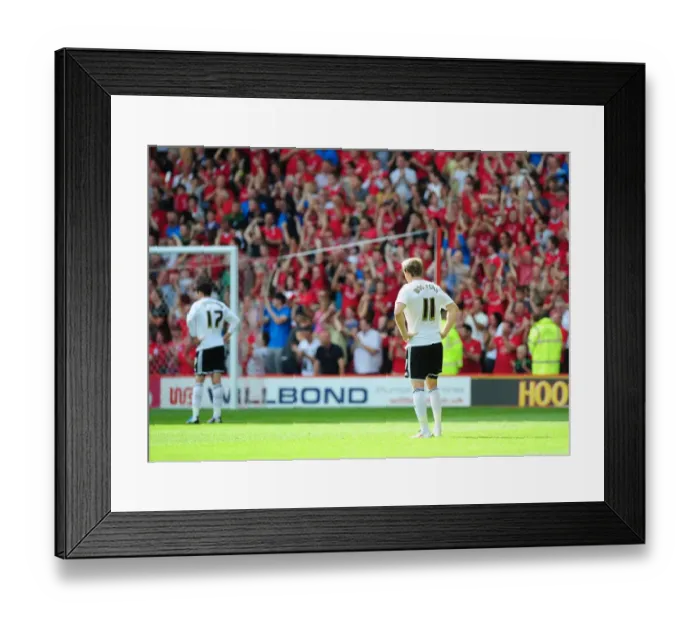 Framed Print : Dejected Bristol City Players as Nottingham Forest Celebrate Championship Victory Framed Print : Dejected Bristol City Players as Nottingham Forest Celebrate Championship Victory
