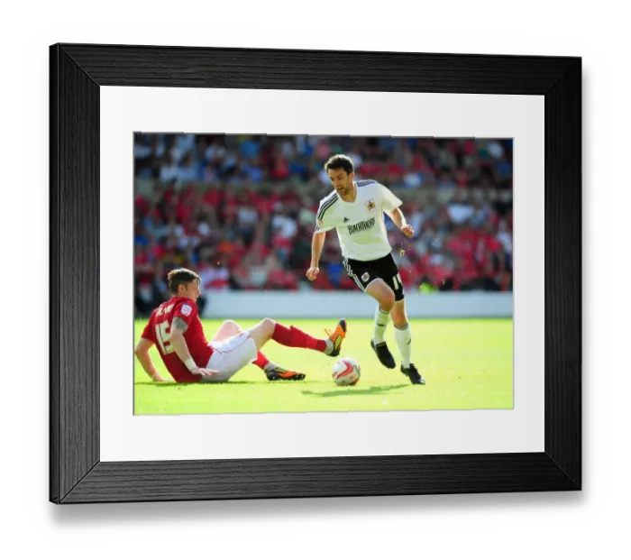 Framed Print : Bristol City's Cole Skuse Dribbles Past Nottingham Forest's Greg Halford in Championship Clash Framed Print : Bristol City's Cole Skuse Dribbles Past Nottingham Forest's Greg Halford in Championship Clash