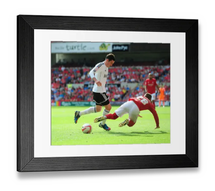 Framed Print : Battling for Control: Cunningham vs. Majewski in Nottingham Forest vs. Bristol City Championship Showdown