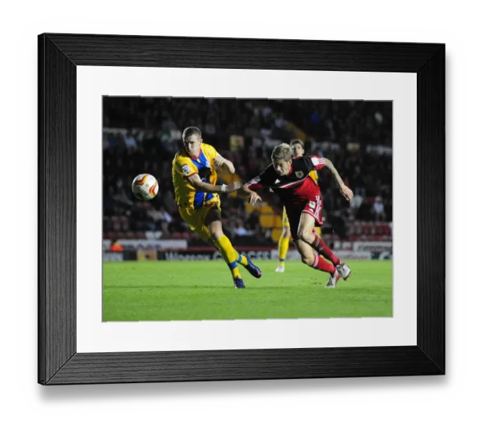 Framed Print : Battling for Supremacy: Jon Stead vs. Peter Ramage in the 2012 Championship Clash between Bristol City and Crystal Palace Framed Print : Battling for Supremacy: Jon Stead vs. Peter Ramage in the 2012 Championship Clash between Bristol City and Crystal Palace