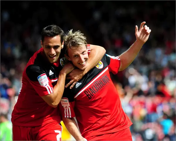 Bristol City's Double Trouble: Woolford and Baldock Celebrate Goals Against Cardiff City, 2012