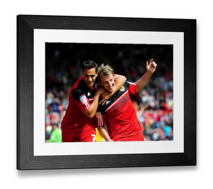 Framed Print : Bristol City's Double Trouble: Woolford and Baldock Celebrate Goals Against Cardiff City, 2012