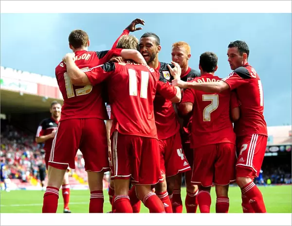 Bristol City's Martyn Woolford Scores Double: Celebration with Team Mates vs Cardiff City (25-08-2012)